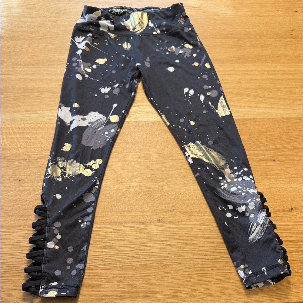 Justice Black and Gold Splatter Leggings with Ruffle